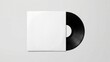 © FoxGrafy - Classic black vinyl record partially revealed from its blank white paper sleeve, perfect for design mockups.