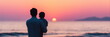 © Phanupong - Father holding his little son standing on beach watching beautiful sunset together peaceful family bonding serene ocean horizon warm emotional moment copy space
