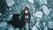 © khan ai photography - Icebreaker ship navigating through arctic waters with floating icebergs, aerial view