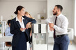 © Pixel-Shot - Young business colleagues near water cooler in office