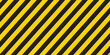 © Nur - Yellow and black striped lines seamless pattern or texture. Under construction and safety background.