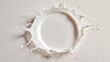 © DaniLana - Milk splash forming an empty center for text advertising layout