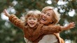 © AZ Studio - Joyful grandmother spinning her granddaughter around in a playful outdoor embrace