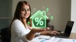 © ABUDARDA - Woman presenting digital house with percentage sign in office