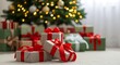 © Junaid - Christmas gifts, wrapped presents with red ribbons, holiday decorations, festive boxes