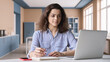 © insta_photos - Hispanic latin girl college student using laptop computer watching distance online learning seminar class, remote university webinar or having virtual classroom meeting in university creative space.