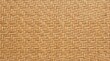 © ProArt - A close-up image of woven rattan material. The material displays a dense, intricate pattern of interwoven strands.