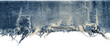 © PNG Creative - Close up texture of distressed blue denim fabric with frayed edges and worn threads showcasing its intricate weave and weathered appearance material textile cotton woven jeans