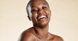 © peopleimages.com - Skincare, happy and portrait of black woman with beauty, natural and facial cosmetics for wellness. Laugh, smile and African female person with face dermatology for glow by studio background.
