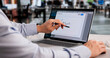 © Andrey Popov - Business Professional Digitally Signing Contract On Laptop Screen