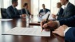 © Masque - Corporate procurement expert reviewing contracts with finance and legal teams for vendor management.