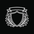 © KamrunNaher99 - White shield with laurel wreath and ribbon on black background