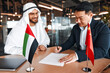 © Valerii Apetroaiei - Diplomatic negotiations between countries in the office