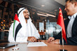 © Valerii Apetroaiei - Diplomatic negotiations between countries in the office