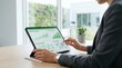 © James - Business woman using tablet to analyze renewable energy usage graphs and carbon neutrality goals, reviewing sustainable development targets and environmental impact data on screen