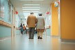 © The Little Hut - Elderly couple walking together down a brightly lit hospital corridor, symbolizing support and companionship