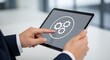 © Nupur - Touching gear icons on tablet for settings configuration