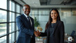 © Storeo_jar - business people shaking hands in office