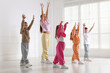 © New Africa - Professional dance teacher training children in studio