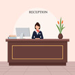 © Putra - Receptionist at the front desk of a hotel or office building.