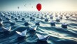 © T - Paper boats, with one boat standing out above the others thanks to a red balloon