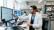 © Royal - A male scientist in a white lab coat is pointing at a computer screen displaying multiple graphs and images in a laboratory setting.