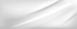 © Mariia - Pearl gradient background. White silk texture with grey color gradation for studio bg. Soft and elegant blur on liquid cloth banner for presentation or thumbnail base. Aesthetic smooth satin effect