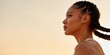 © Andrii Zastrozhnov - Young woman profile portrait during golden hour outdoors