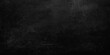 © Creative Arts - A dark grunge chalkboard backdrop with an empty aged paper texture, vintage grey concrete pattern. Dark charcoal grey slate texture background, moody industrial stone surface. weathered grit and grain
