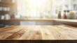 © MasTPX - Wooden tabletop surface provides a foreground focus with a blurred kitchen background offe a bright, clean, and modern space for various product displays.