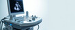 © Viktor - Modern medical ultrasound machine shows fetal image on screen. Diagnostic tool with keyboard and controls in clinic setting. Health care technology for prenatal exam.