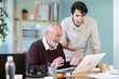 © JackF - Surprised and joyful men looks at laptop monitor screen. Great news, unexpected luck, or win. Guy and elderly man share joy and exult over encouraging news