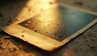 © Viktor - Old photo lying on dusty surface with warm light shining. Image shows texture wear and tear. Blank space allows for custom content. Retro aesthetic.