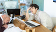 © JackF - Tired male office workers having nap while sitting in his workplace