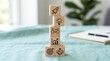 © alex - Wooden blocks with icons representing business growth and startup success