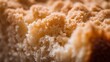 © Plaifah - Textured close-up of fresh homemade bread crust showcasing golden color and intricate patterns perfect for culinary and food photography