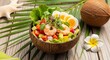 ©  AH Creation - Fresh shrimp salad in coconut bowl with tropical leaves and flower