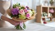 © Olsek - Beautifully arranged bouquet of fresh flowers showcasing various colors and textures held by a florist ready for delivery or gifting. Generative AI