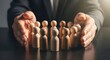 © MR HEPPY - Protection and leadership concept, wooden human figures standing in a circle.