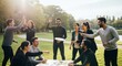 © Eka - Diverse team building activity outdoors in a park