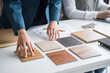 © Charlie's - Interior designers brainstorming creative design ideas for modern home in collaborative meetingใ