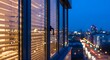 © genovevaava - Apartment window at night with warm ambient interior lighting photo