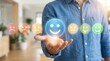 © Masque - A person holding a blue happy smile face icon representing positive thinking and mental health assessment.