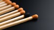 © Yuparet - Operational Collapse, Organizational Failure, Collection of Matchsticks with One Burned Out and Unlit Sticks on a Black Surface for Stock Photography
