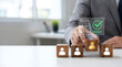 © Mk Design store - Human resources and recruitment concept with businessman choosing golden person on wooden block, Job interview and employment strategy concept with virtual HR dashboard over wooden cubes.
