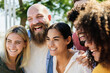 © Xavier Lorenzo - Happy diverse group of students enjoying summer together outdoors. Young people sharing fun moments with strong community spirit and positive energy in a sunny setting. Lifestyle and youth concept.