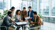 © Vika art - Multiracial business team analyzing financial data on a large digital tablet in a modern office.
