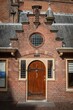 © Moritz Wolf/imageBROKER - Side entrance, medieval church St. Bavokerk, province North Holland, Holland, Netherlands