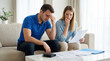 © AucArtStudio - Finance budget couple bill debt stress money paperwork calculator home finance Worried couple. Calculating budget family monthly finance planning, savings, responsibility, management
