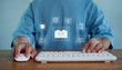 © paripat - Online learning concept with person using computer keyboard and digital book icons, representing e-learning, education technology, knowledge access, remote study, and modern training solutions.
